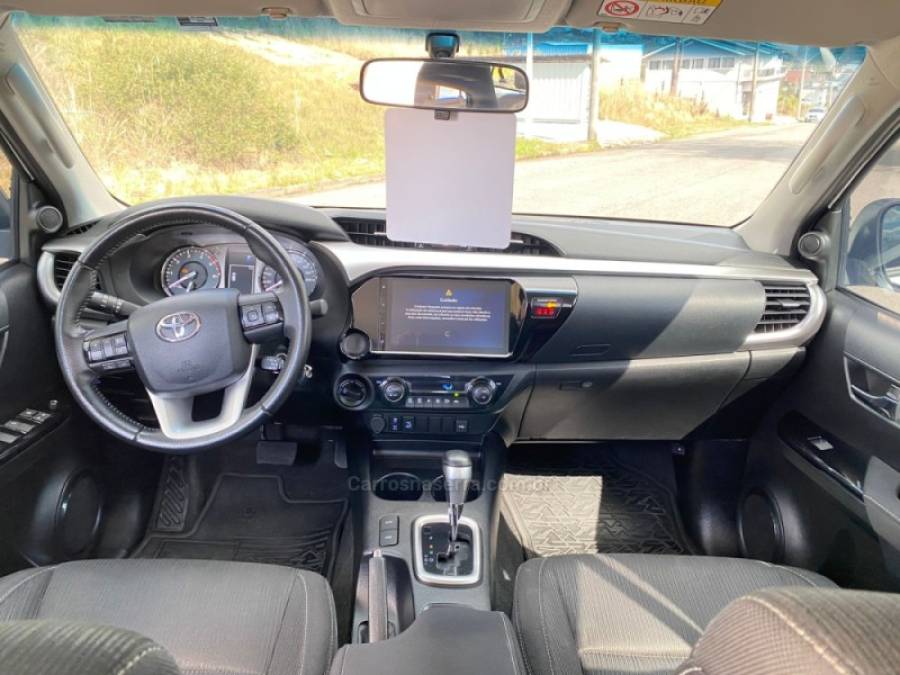 TOYOTA - HILUX - 2024/2024 - Branca - R$ 230.000,00